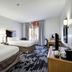 Fairfield Inn & Suites by Marriott San Antonio Boerne guest room with two beds and desk