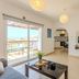 Artemis Cynthia Complex in Paphos: modern suite with balcony, sea view, TV area and seating