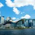 60 West Hotel in Hong Kong with harborfront skyline and modern curved waterfront building
