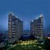 Hengshan Garden Hotel in Shanghai at night, featuring two illuminated towers above a lit courtyard