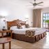 Be Live Experience Hamaca Suites in Boca Chica guest room with king bed and balcony view