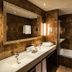 Concorde Green Park Palace bathroom in Port El-Kantaoui with double sink, large mirror, and bathtub
