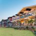 Onslow Beach Resort in Onslow, beachfront resort exterior with balconies, umbrellas and landscaped gardens