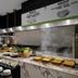 DoubleTree by Hilton Weihai buffet counter with hot dishes, soups, and plated food in Weihai