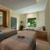El Dorado Seaside Palms, Kantenah Bay spa room with two massage tables and garden-view window