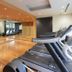 Mitsui Garden Hotel Kashiwa-No-Ha gym with treadmills and mirrored wood-floored fitness room in Kashiwa