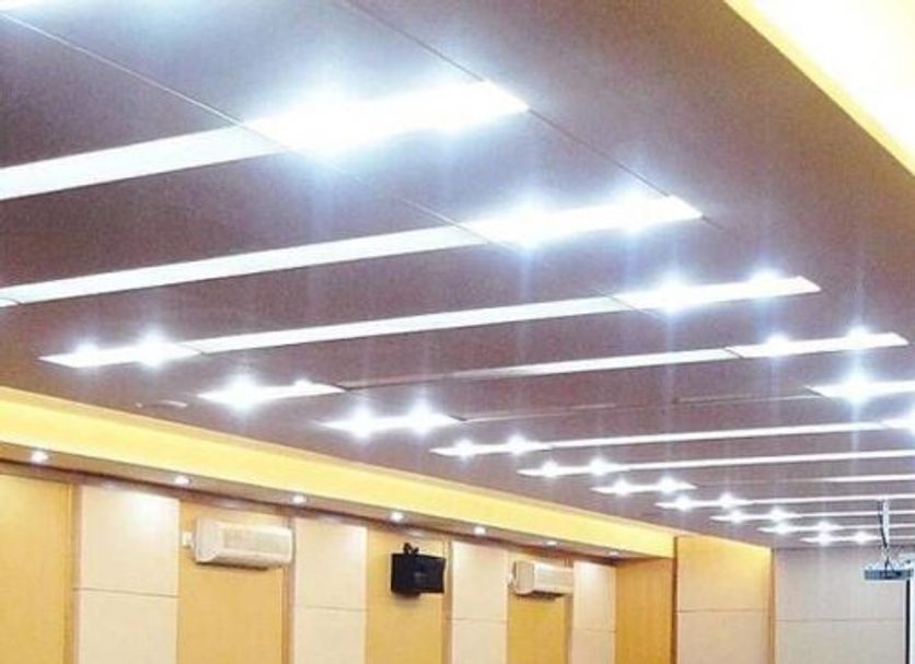 Wealth Shenzhen conference room with rows of banquet chairs and bright ceiling lights