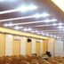 Wealth Shenzhen conference room with rows of banquet chairs and bright ceiling lights