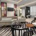 Crowne Plaza San Antonio Airport By IHG lobby seating area with lounge chairs and tables