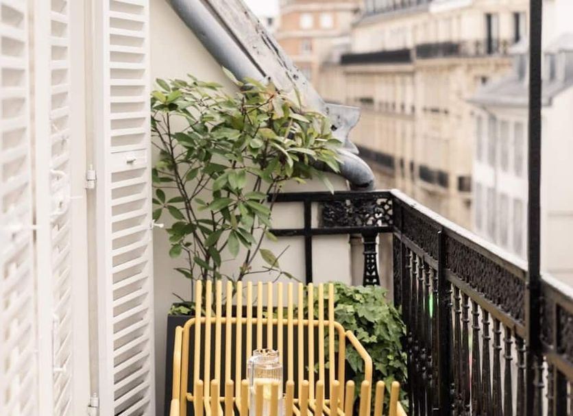 Balcony at 1.75 Paris La Source in Paris with potted plants and city views