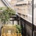 Balcony at 1.75 Paris La Source in Paris with potted plants and city views