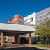 Courtyard by Marriott Nashville Goodlettsville exterior with covered entrance and clear blue sky