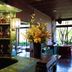 Hana No Shizuku in Ureshino bar lounge with illuminated display shelf and floral arrangement