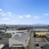 Apa Hotel Kanazawa Nishi in Kanazawa with city and mountain views from an upper-floor window