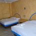 Hotel Casa Vieja in Puerto Escondido room with two beds and tiled floor