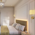 The Clements Hotel Cambridge guest room with king bed, desk nook and wall-mounted TV