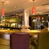 Premier Inn Ashford - Eureka Leisure Park bar with curved counter, beer taps and red pendant lights