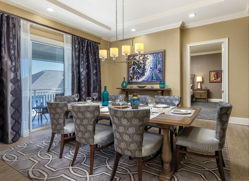 Club Wyndham Nashville dining room with table, chandelier, balcony, and city views