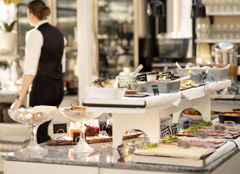 Gränsö Slott Hotel & Spa buffet spread with pastries, fruit and cold dishes in Västervik