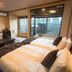 Livemax Resort Hakone Ashinoko room with twin beds and balcony view in Hakone