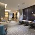 Kitayuzawa Mori no Soraniwa in Date: modern lounge with curved workstations, chairs and large window shades