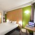 B&B HOTEL Dieppe room in Saint-Aubin-sur-Scie with double bed, desk, and wall-mounted TV