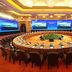 Dongjiao State Guesthouse, Nanjing, conference room with large round table and wall-mounted screens