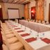 Hôtel Colbert Palace in Antananarivo meeting room with U-shaped conference table and cream chairs