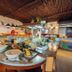 Muthu Lake Naivasha Country Club buffet station with salads, dishes and glass display counter in Naivasha