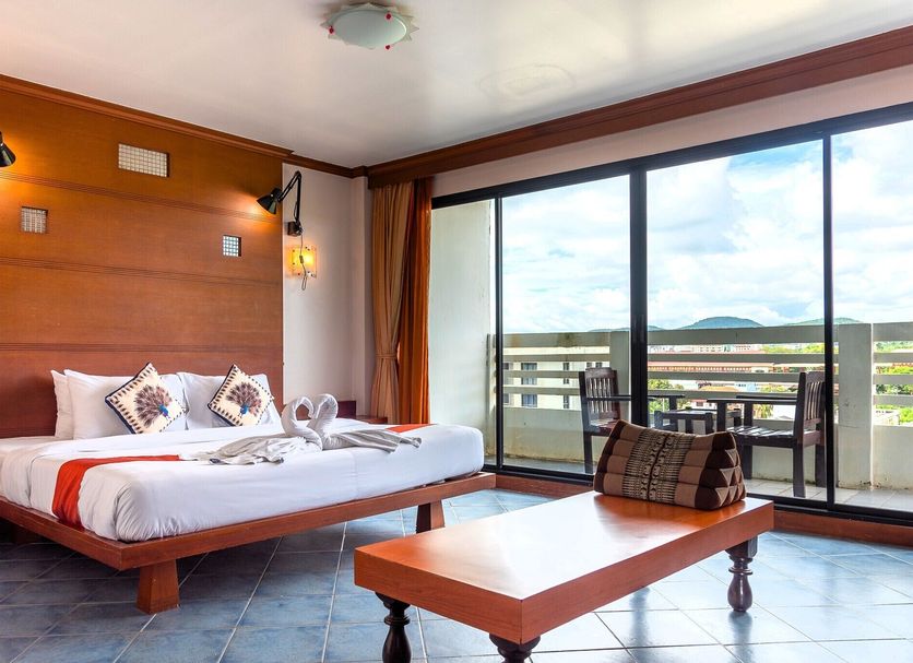 Hua Hin Loft room with king bed, balcony doors and hill view in Hua Hin