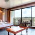 Hua Hin Loft room with king bed, balcony doors and hill view in Hua Hin
