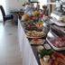 Hotel Ackermann in Riedstadt buffet table with pastries, fruit, cold cuts and covered serving trays