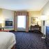 Hampton Inn By Hilton Elliot Lake guest room with bed, window, desk, and TV