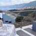 Miramare Scilla Gyh Luxury terrace with wine, grapes and coastal sea view in Scilla