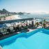 Pestana Rio Atlântica rooftop pool with ocean and beach views in Rio de Janeiro