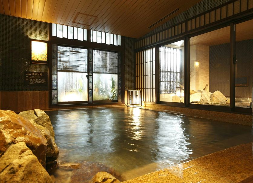 Dormy Inn Premium Wakayama Natural Hot Spring indoor hot spring bath with large windows in Wakayama