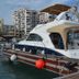 Hotel Marfil in Sant Antoni de Portmany with a luxury yacht docked at the marina