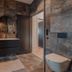 Nisser Hyttegrend Og Camping, Treungen: modern bathroom with vanity, round mirror, shower and wall-hung toilet