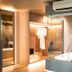Sentido Khaolak in Khao Lak bathroom with freestanding tub, glass shower, vanity and robe closet