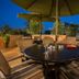 TownePlace Suites by Marriott Dallas Lewisville outdoor patio with table, chairs and umbrellas