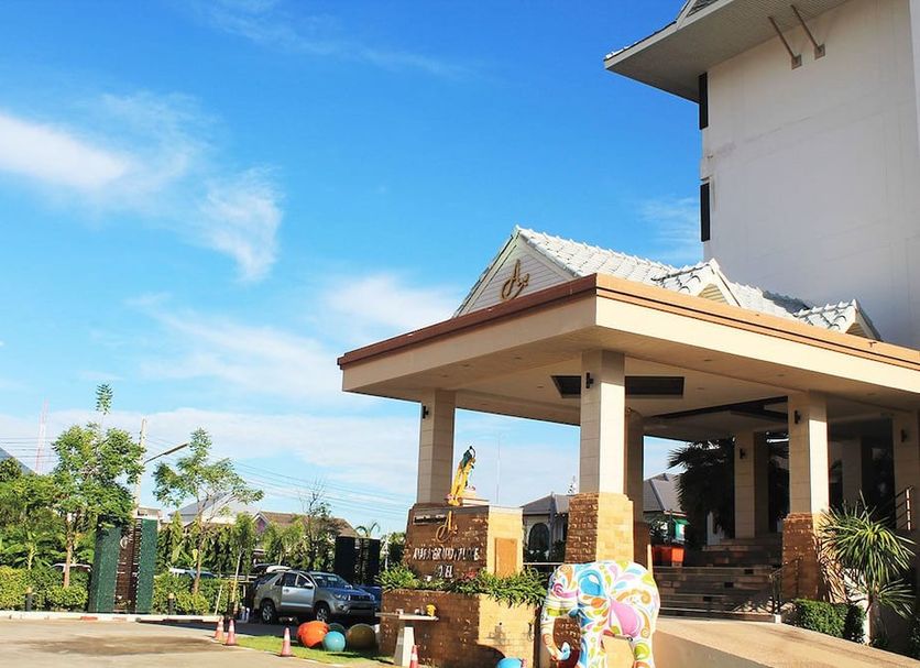 Ayara Grand Palace Hotel in Phitsanulok with a covered entrance and landscaped driveway