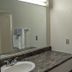 Western Inn Motel & RV Park Fairplay bathroom sink with granite vanity and towels hanging on wall