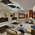 Hilton Dubai The Walk lobby seating area with modern circular chandeliers in Dubai