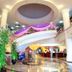 The Putra Regency Hotel in Kangar lobby with curved balcony, columns and decorative lighting