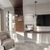 Marine Hotel by Zdrojowa in Kolobrzeg suite with sea view, chair, kitchenette and TV