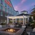 Hilton Garden Inn Cedar Falls outdoor patio with fire pit and pergola seating
