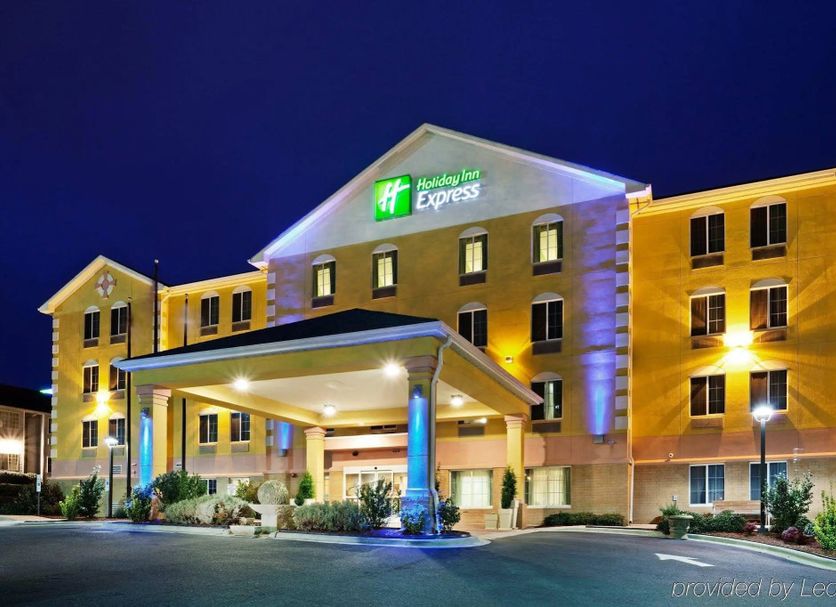 Holiday Inn Express Charlotte West - Gastonia By IHG exterior at night with lit entrance in Gastonia