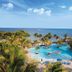 Coconut Bay Resort in Vieux Fort with a tropical pool overlooking the ocean and island