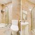 Belvilla Ilford Station Hotel bathroom with glass shower enclosure, toilet and compact sink in Ilford