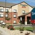 TownePlace Suites by Marriott Aberdeen hotel exterior with entrance sign and landscaped front drive